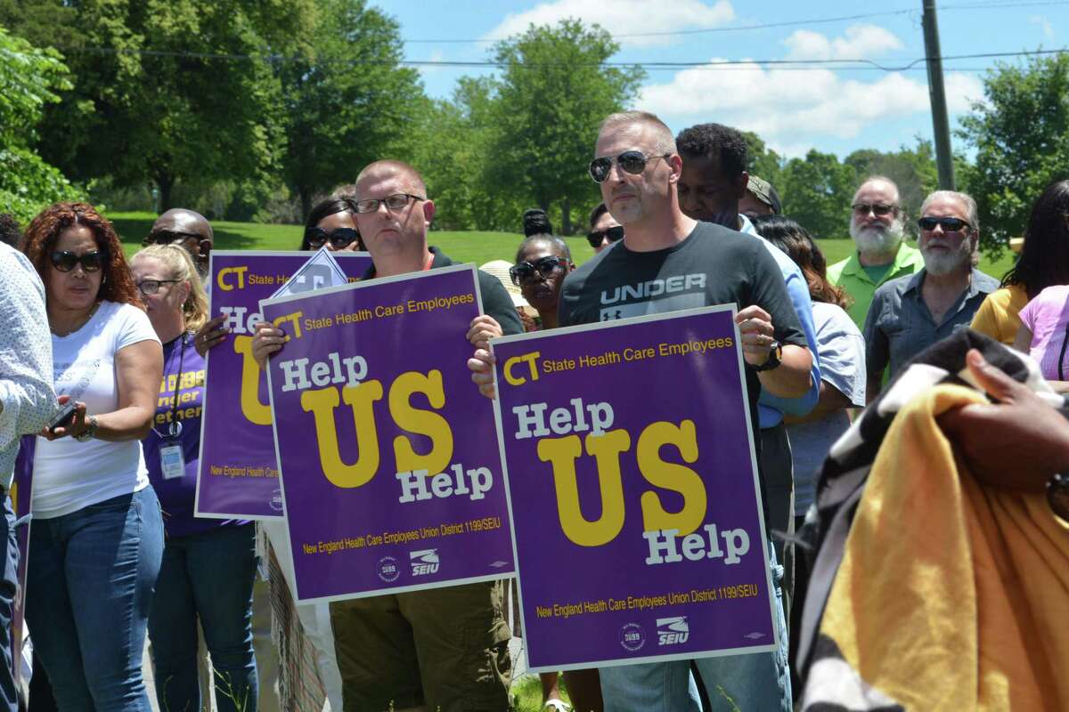 Caregivers, staff and Local 1199 union workers at Connecticut Valley Hospital and the maximum security prison Whiting Forensic Hospital held a rally Wednesday afternoon to advocate for improvements in staffing ratios, resources and safety protocols.