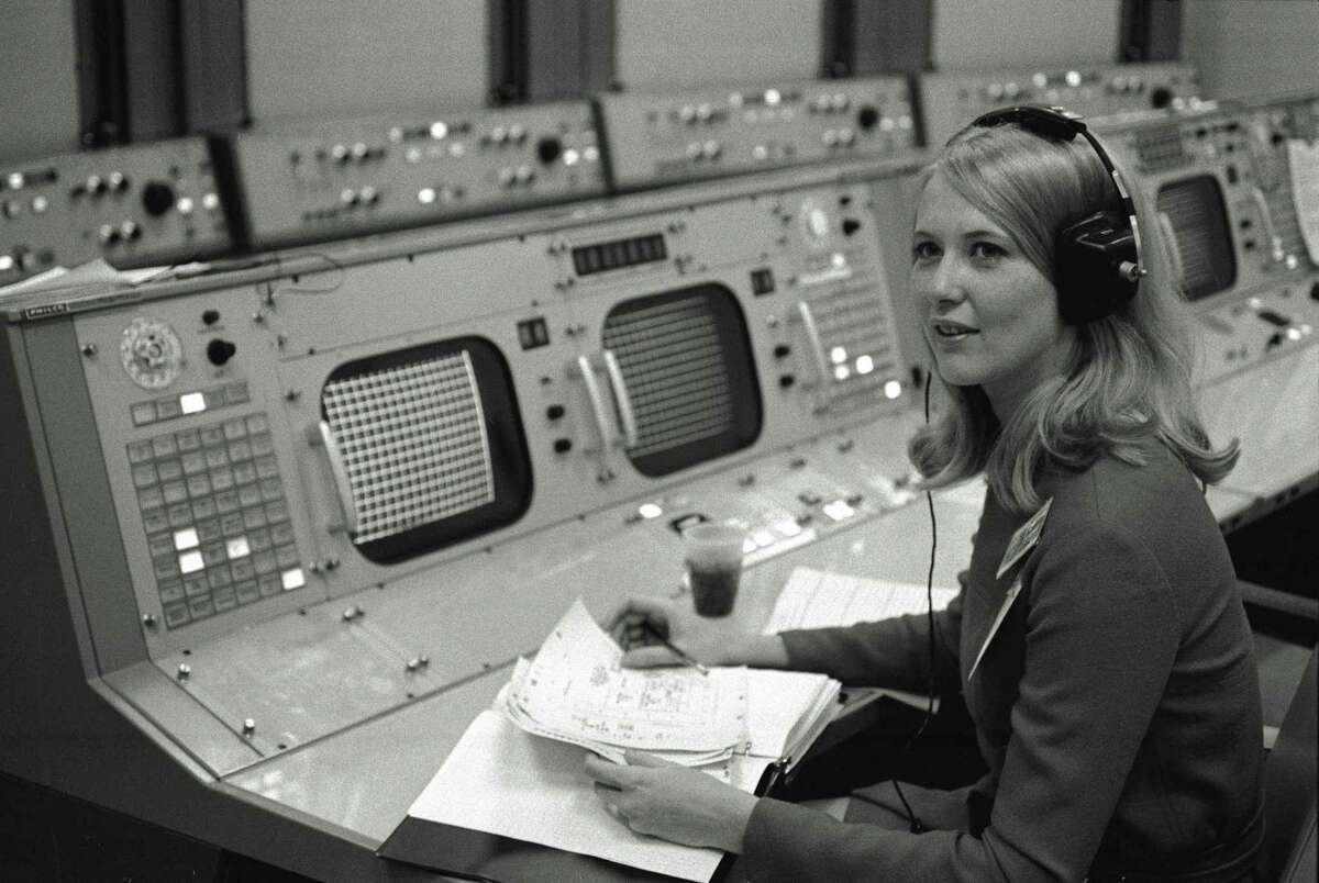 This 1969 photo features Frances 'Poppy' Northcutt of TRW Inc., the American corporation involved in the aerospace industry, during a scientific demonstration at NASA for the Apollo 11 mission.