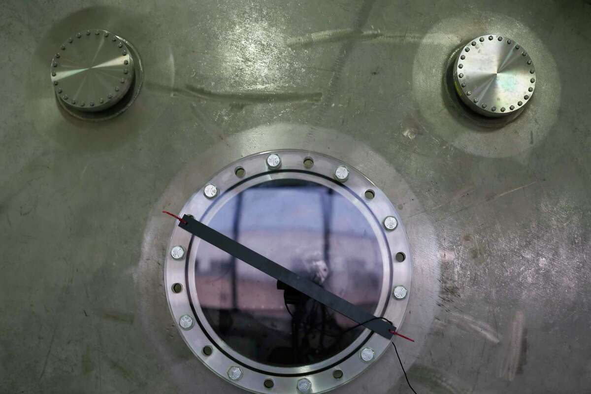 This photo shows windows for Ad Astra Rocket Company's 150 m3 vacuum chamber on June 4, 2019, in Houston. Ad Astra Rocket Co., is working to develop a different kind of rocket engine that would be cheaper and faster than traditional chemical combustion.