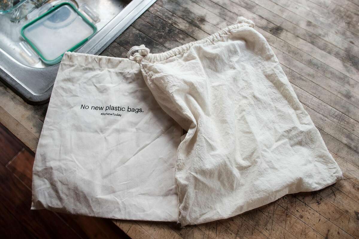 Reusable cloth shopping bags sit on the counter at the home of Kathryn Kellogg, an expert in reducing plastic waste, in Berkeley, Calif, on Friday, April 9, 2019.