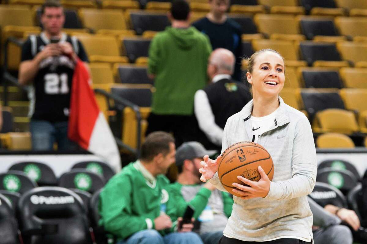 San Antonio Spurs assistant coach Becky Hammon smiles during a pre-game shoot around before a game against the Boston Celtics at TD Garden on March 24, 2019 in Boston, Massachusetts.
