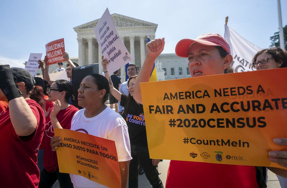Demonstrators gather at the Supreme Court as the justices finish the term with key decisions on gerrymandering and a census case involving an attempt by the Trump administration to ask everyone about their citizenship status in the 2020 census, on Capitol Hill in Washington, Thursday, June 27, 2019. (AP Photo/J. Scott Applewhite)
