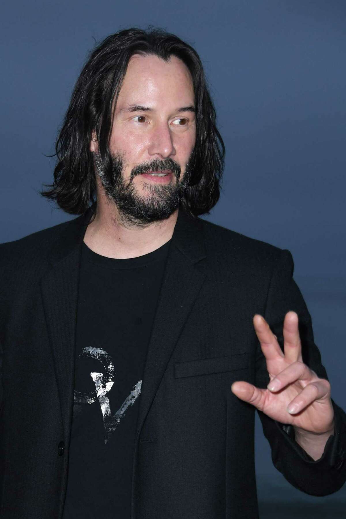 Canadian-US actor Keanu Reeves arrives for the Saint Laurent Men's Spring-Summer 2020 runway show in Malibu, California, on June 6, 2019. (Photo by Valerie MACON / AFP)VALERIE MACON/AFP/Getty Images