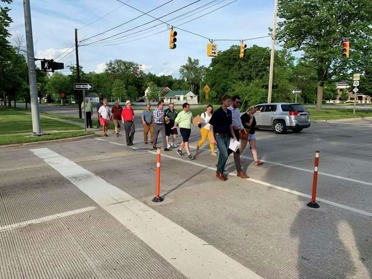 Members of the Midland Planning Commission and Downtown Development Authority, along with members of the general public, tour the area of downtown Midland affected by the Buttles Street 'road diet' on June 27, 2019. (Mitchell Kukulka/Mitchell.Kukulka@mdn.net)