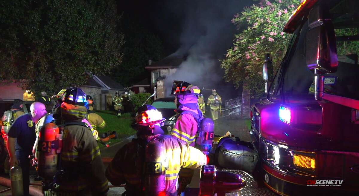 Volunteer firefighters rescue family pet from CyFair house fire