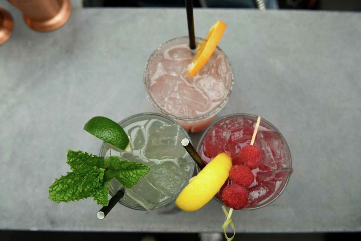 Clockwise from top: blood orange margarita, virgin raspberry lemonade, and a champaign mojito are seen on the Patio at 15 Church are seen on Friday, May 24, 2019 in Saratoga Springs, N.Y. (Jenn March, Special to the Times Union )