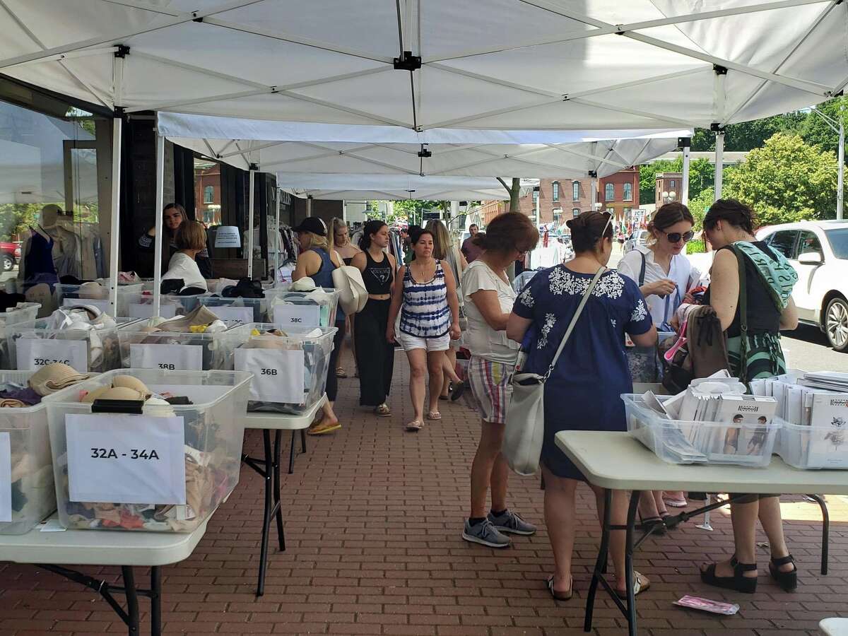 Shoppers peruse during the annual Westport Sidewalk Sale throughout Main Street, Post Road and areas surrounding downtown on June 28, 2019.