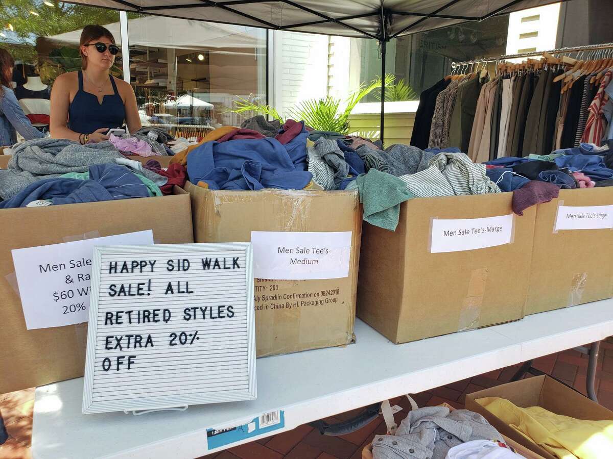 Shoppers peruse during the annual Westport Sidewalk Sale throughout Main Street, Post Road and areas surrounding downtown on June 28, 2019.