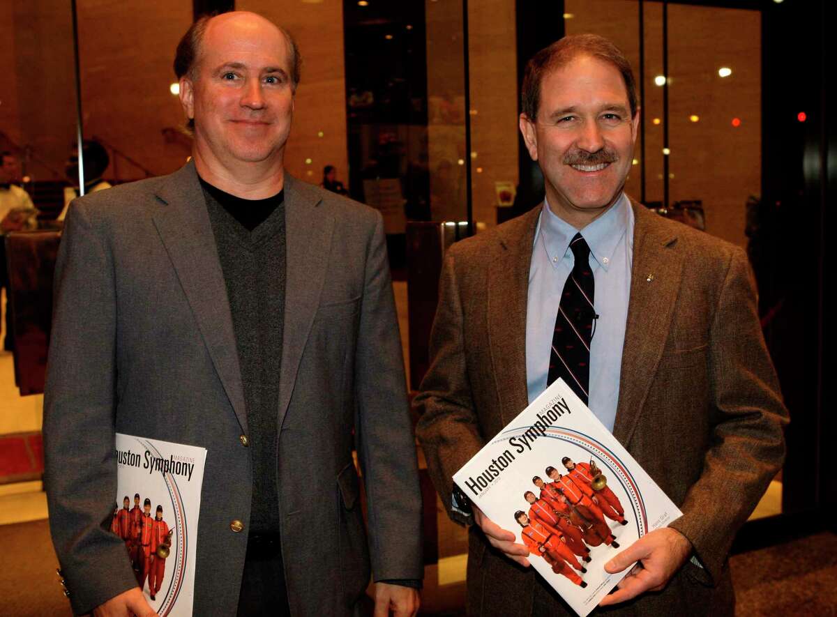Scott Vangen, left, with NASA Kennedy Space Center and astronaut Dr. John Mace Grunfeld, right, at the opening-night of the world premiere of the Houston Symphony's The Planets Thursday, Jan. 21, 2010, in Houston. ( Melissa Phillip / Chronicle ) for Douglas Britt story