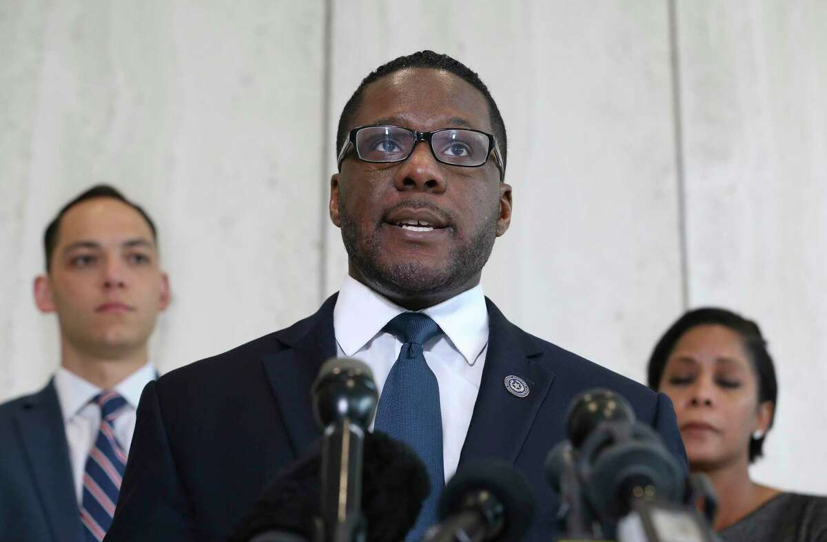 Civil Rights Division attorneys Michael Harrison, center, Gavin Ellis and Natasha Sinclair of the Harris County District Attorney’s Office answering questions about the indictment of Officer Shane Privette on Thursday, June 27, 2019, in Houston. Privette allegedly hit Dwayne Walker in the face with his knee outside a gas station during an arrest on Nov. 14, 2017. A grand jury indicted Privette Wednesday.
