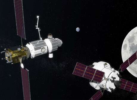 An artist’s conception shows the Deep Space Gateway in the vicinity of the moon, with an Orion crew vehicle nearby.