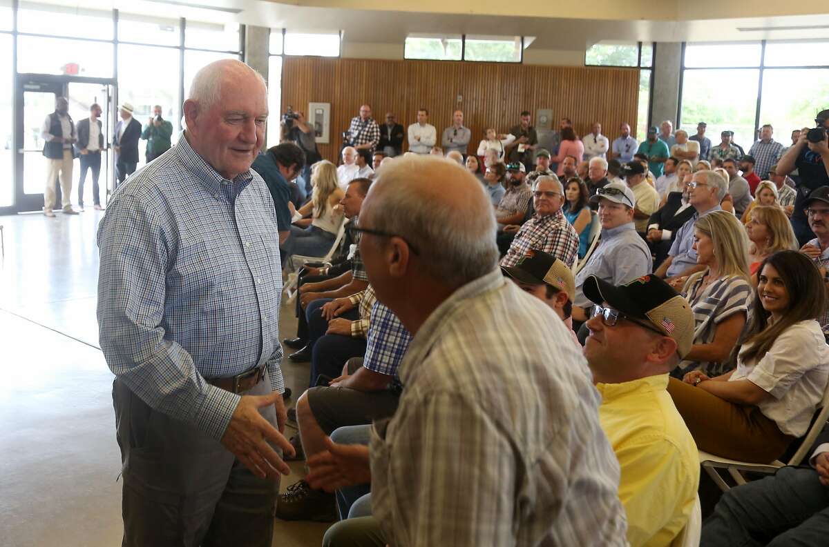 Agriculture Secretary Sonny Perdue greets Alex Dvorkin, right, prior to a town hall meeting on agriculture in the Central Valley on Friday, 6/28, 2019 at Los Banos Fairgrounds Park in Los Banos, California.