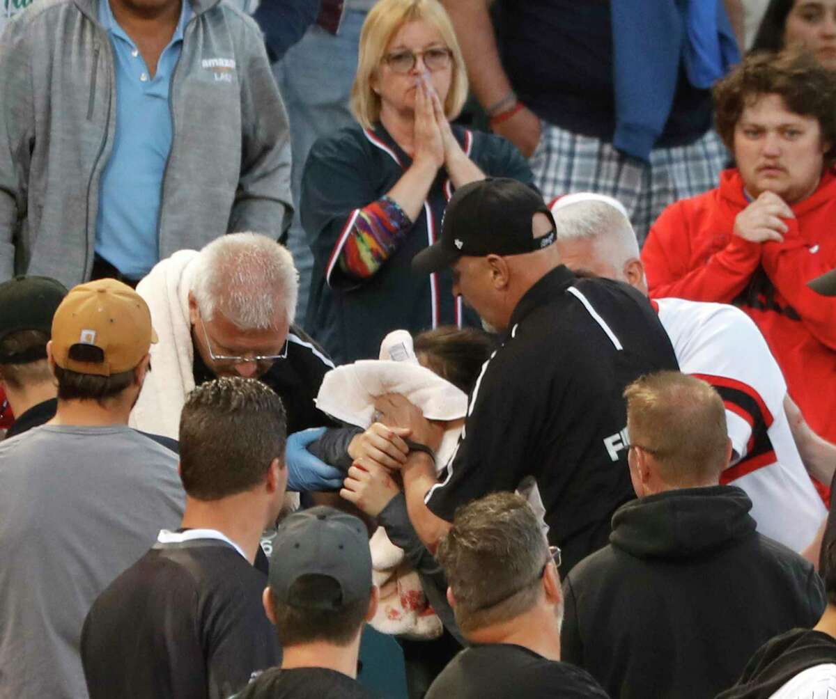 Day after girl struck by foul, Dodgers studying more netting