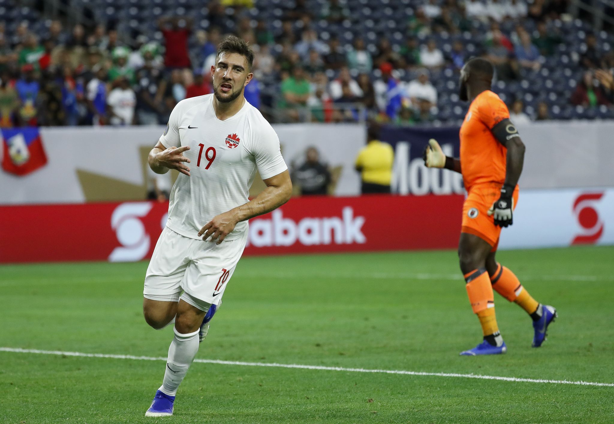 Houston, TX, USA. 29th June, 2019. Canada forward Lucas Cavallini (19)  celebrates his goal during the 1st half of a CONCACAF Gold Cup  quarterfinals soccer match between Haiti and Canada at NRG