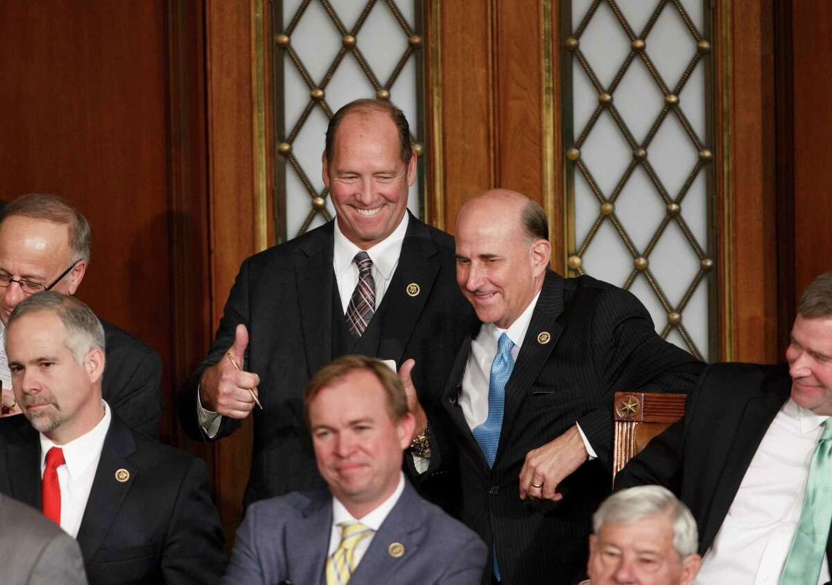 Rep. Ted Yoho, R-Fla., signals a thumbs up as he and Rep. Louie Gohmert, R-Texas, voted for themselves during their challenge to House Speaker John Boehner of Ohio, Tuesday, Jan. 6, 2015, at the opening session of the 114th Congress on Capitol Hill in Washington. Despite the embarrassing slap, 25 Republicans voted for other candidates or voted present, considering Boehner to be too accommodating and not conservative enough. (AP Photo/J. Scott Applewhite)