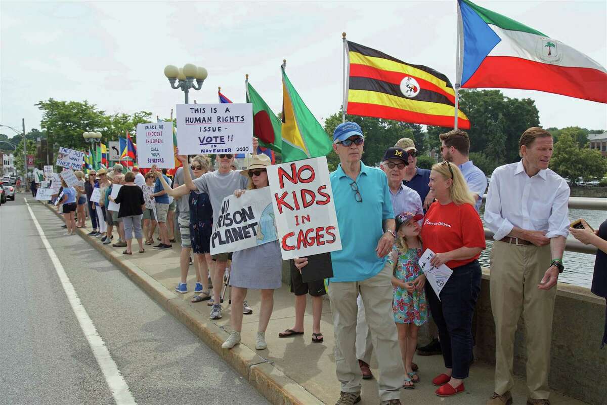 Close to 100 people took part in the protest against U.S. detention centers on the Ruth Steinkraus Cohen Bridge in June.
