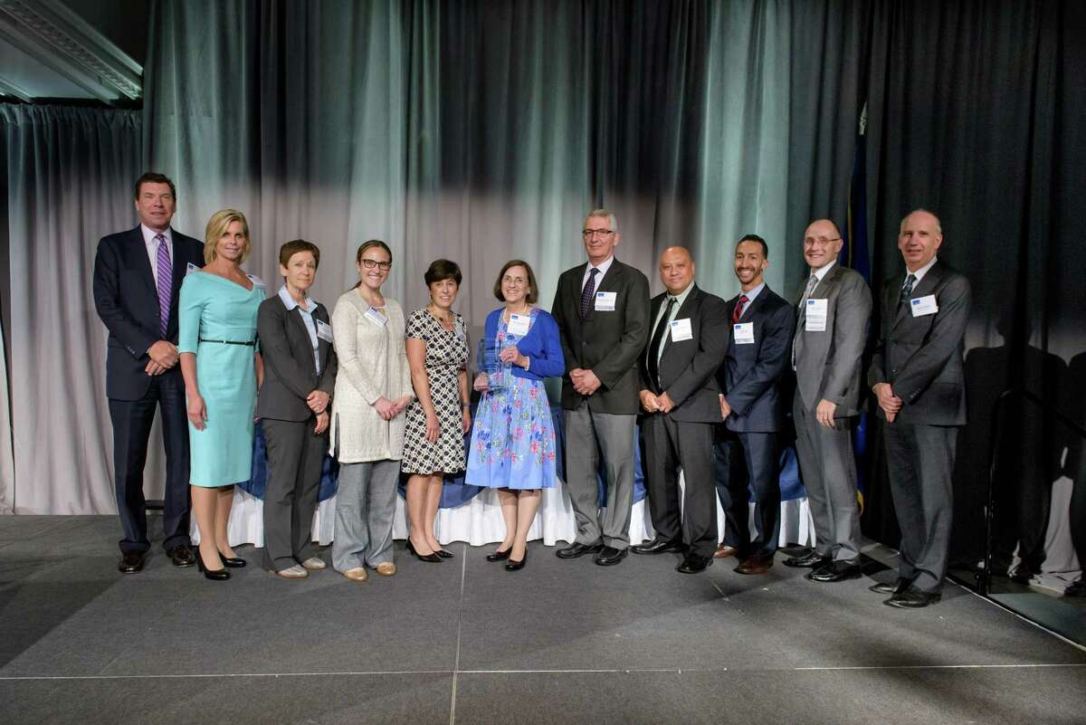 Members of the Norwalk Hospital Joint Replacement Center and also Norwalk Hospital senior leadership at Connecticut Hospital Association Annual Meeting Awards Ceremony in June 20, 2019. The Norwalk Hospital Joint Replacement Center won this year’s highest quality award from the CHA: The John D. Thompson award for excellence in the delivery of healthcare through the use of data. From left, Dr. John Murphy, Deborah Canet, Leslie Lincoln, Laura Fratarcangeli, Anne Newton, MaryAlice Morton, Dr. Nicholas Polifroni, Carey Villafranca, Virgil Sosa, Peter Cordeau, Robert Friedberg