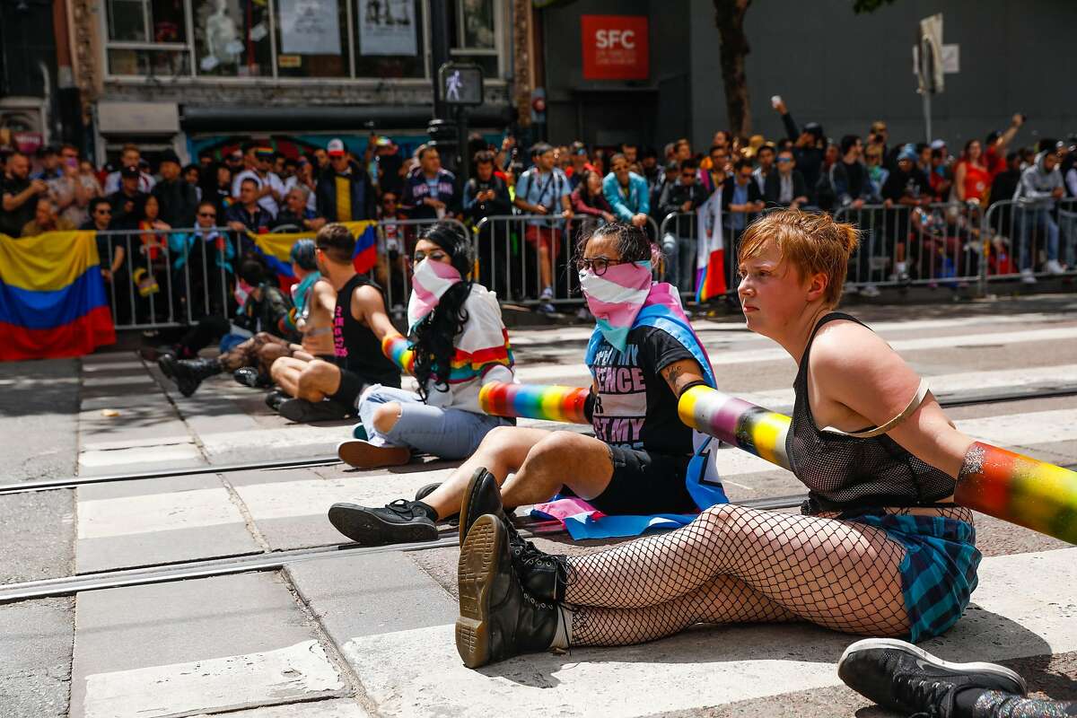 Antipolice demonstrators lying in street shut down Gay Pride Parade