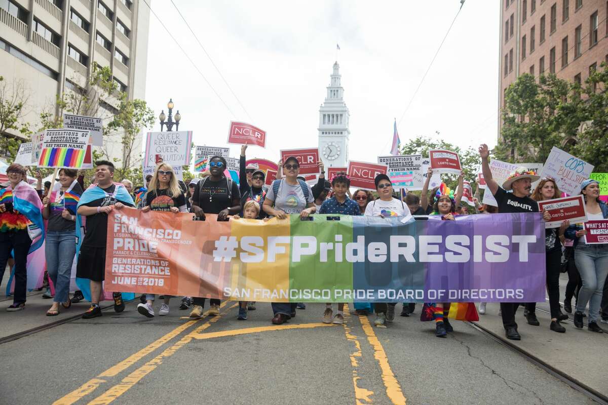 Participants take part at the start of the 2019 San Francisco Pride Parade on Market Street in San Francisco on June 30, 2019.