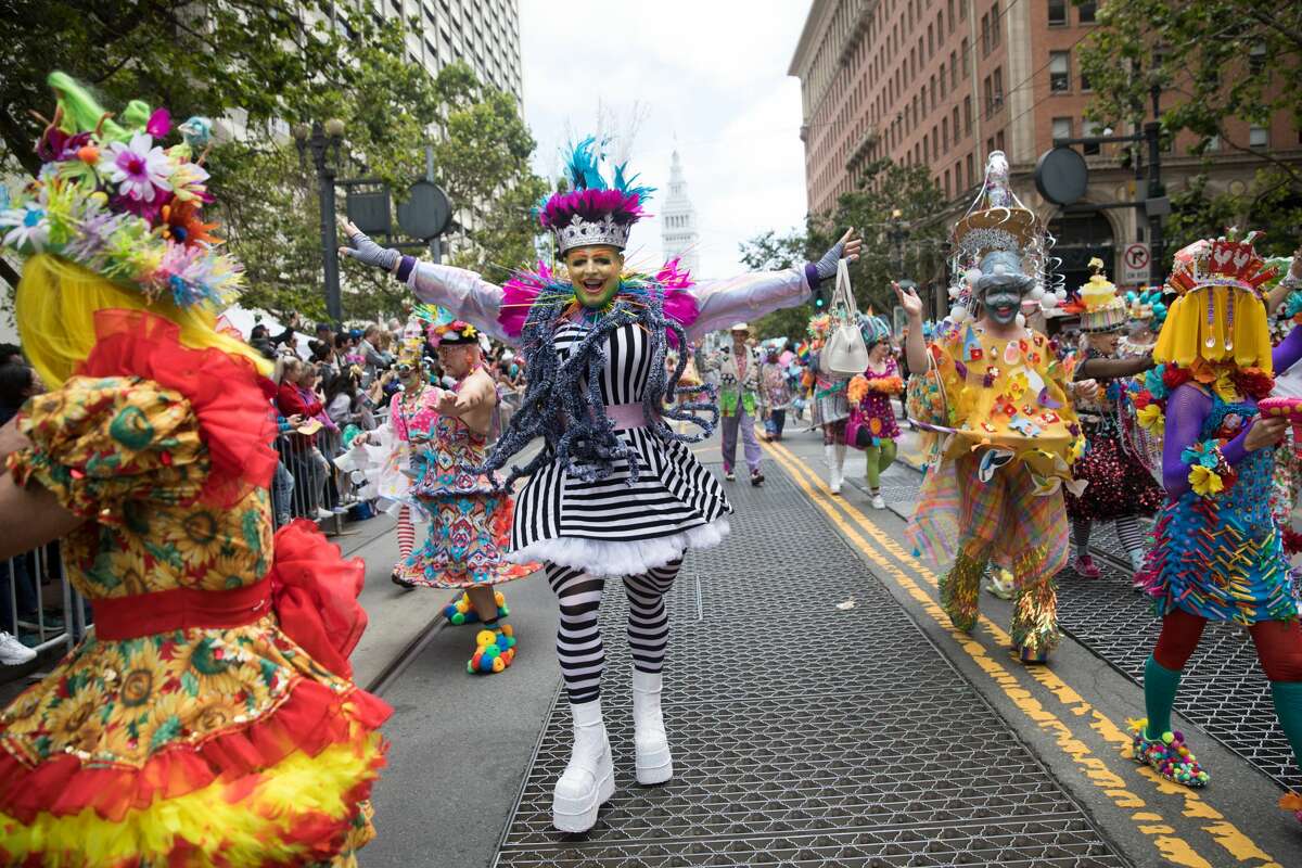 Participants in costumes take part in the 2019 San Francisco Pride Parade on Market Street in San Francisco on June 30, 2019.