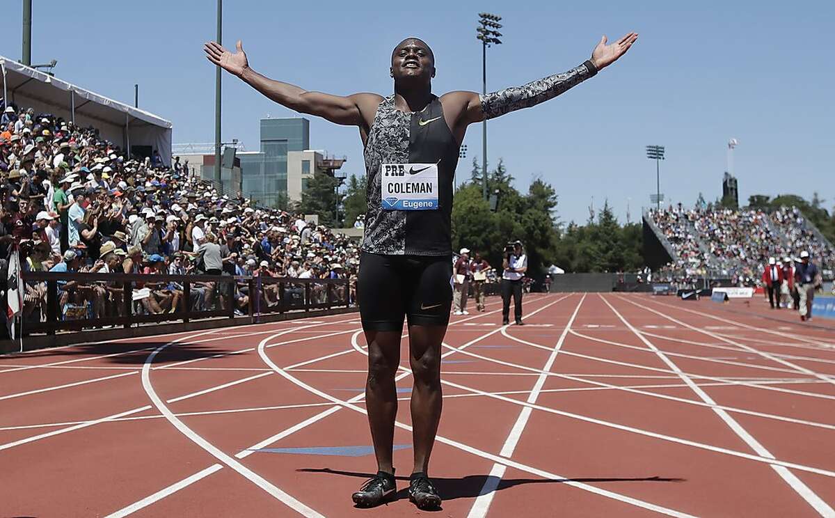 United States' Christian Coleman poses for photos after winning the men's 100-meter race during the Prefontaine Classic, an IAAF Diamond League athletics meeting, in Stanford, Calif., Sunday, June 30, 2019. (AP Photo/Jeff Chiu)