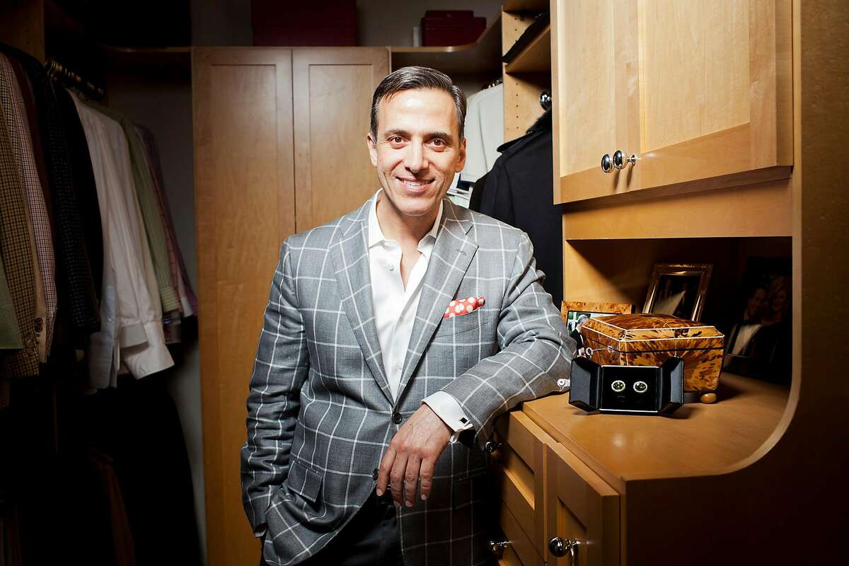 Alan Malouf, a third generation San Franciscan and dentist specializes in reconstructive and cosmetic dentistry, stands for a portrait with his collection of cuff links at his home in San Francisco, Calif. on Friday, Feb 3rd, 2012