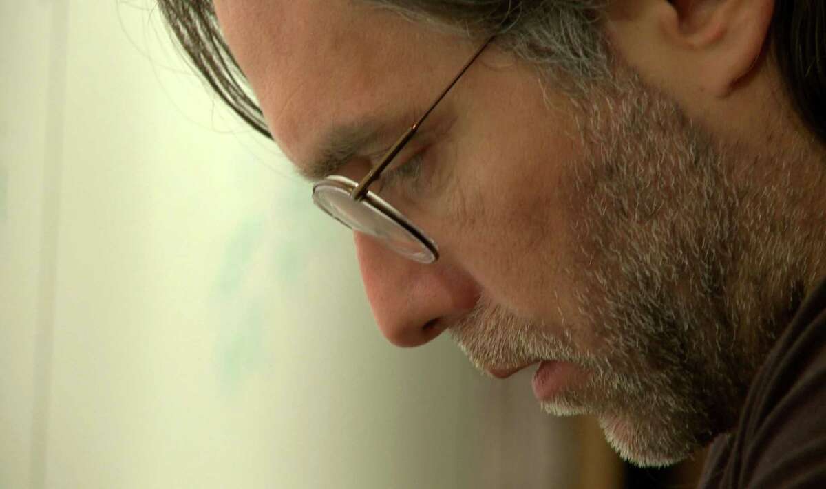 Keith Raniere is pictured at his 8 Hale Drive townhouse in a 2012 video in Halfmoon, N.Y. The video was submitted as evidence in the federal trial of Raniere. A former jailmate of NXIVM leader Keith Raniere, who duped investors into pouring millions of dollars into non-existent film projects, is facing more legal trouble. (U.S. Government exhibit)