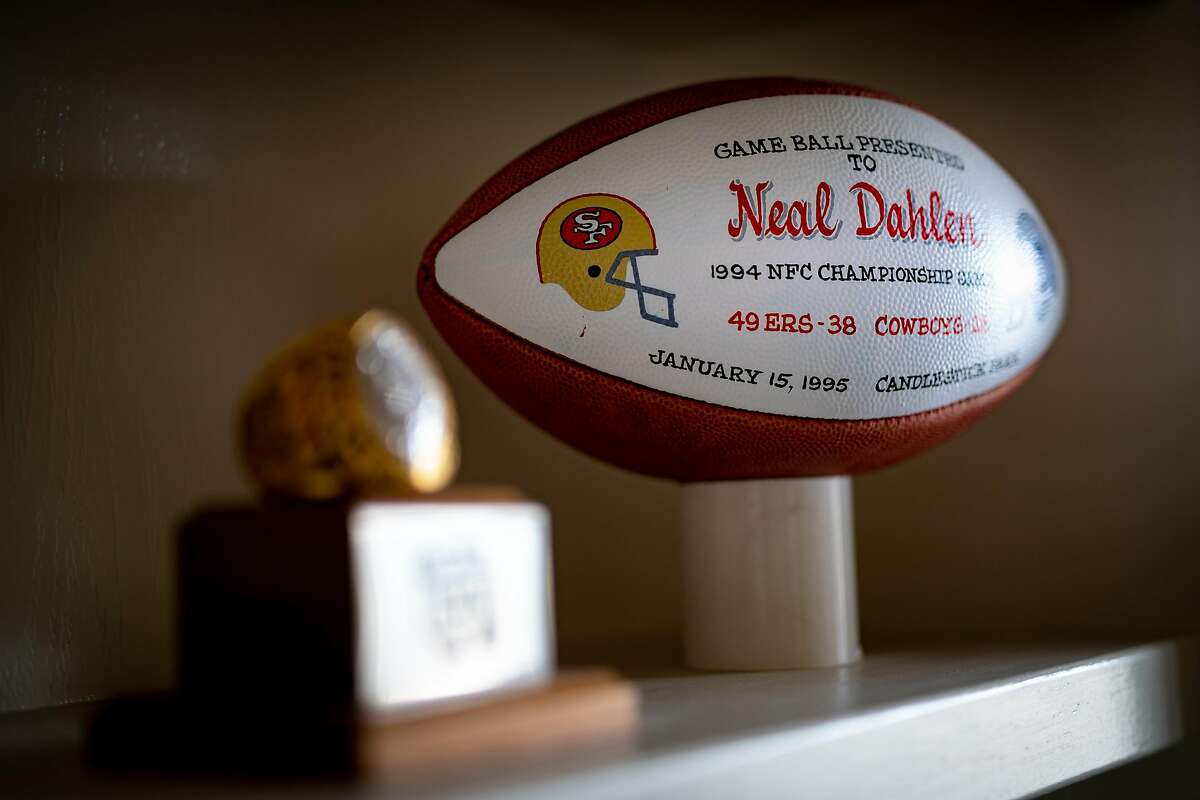 A game ball from the San Francisco 49ers 1994 NFC Championship Game sits on display in Neal Dahlen's home in Aurora, Colo. on Sunday, April 7, 2019. Dahlen earned seven Super Bowl rings over the course of his career as an executive with the San Francisco 49ers and the Denver Broncos. (Autumn Parry/Special to the Chronicle)