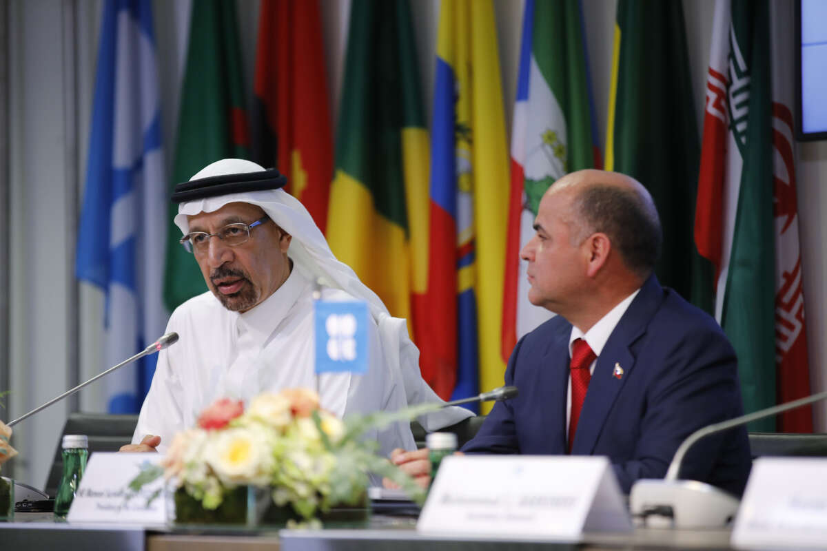 Khalid Al-Falih, Saudi Arabia's energy and industry minister, left, speaks while Manuel Quevedo, Venezuela's petroleum minister and president of the Organization of Petroleum Exporting Countries (OPEC), listens at a news conference following the 176th OPEC meeting in Vienna on July 1, 2019. NEXT: See the member nations of OPEC. 