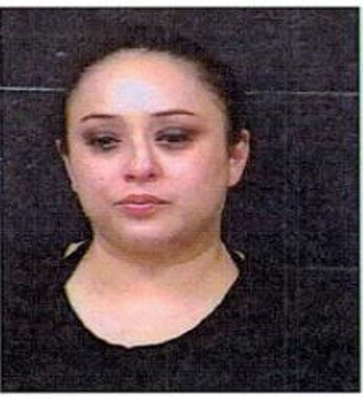 Claudia E Leal was charged with driving while intoxicated with a child under 15 years of age.