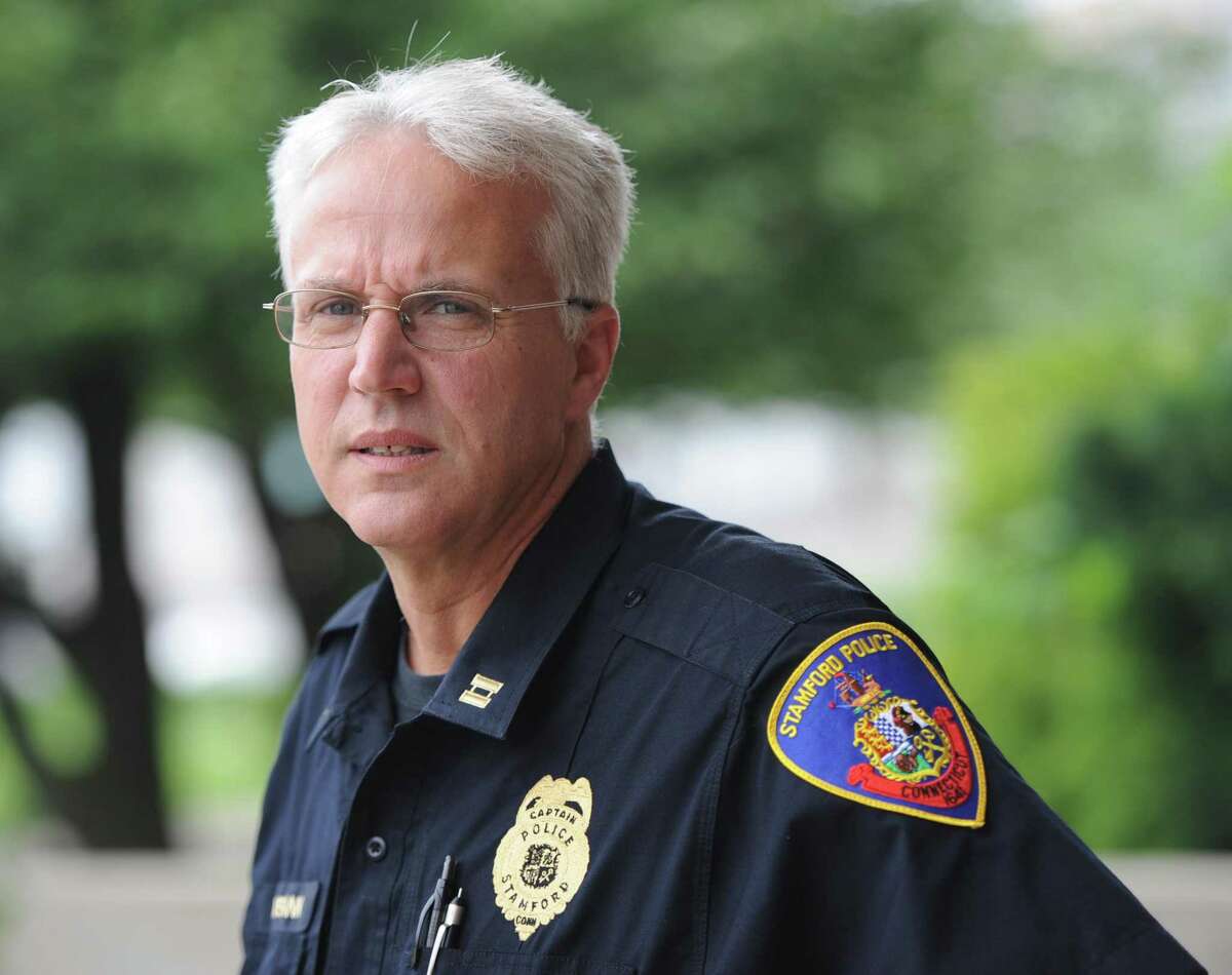 Stamford Police Downtown Patrol Capt. Tom Wuennemann outside the Stamford Police Headquarters in 2015.