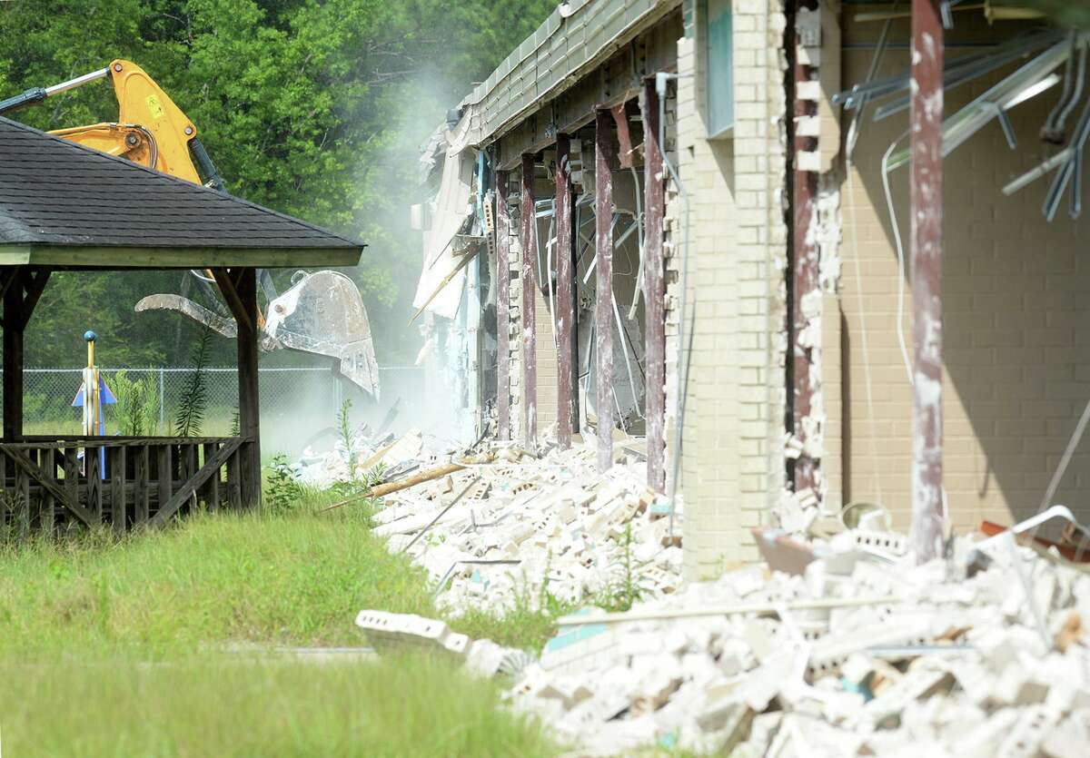 Work crews started demolition this week on Oak Forest Elementary in Vidor. The city's Superintendent Jay Killgo said Tuesday that the district's FEMA claim was settled at $13.8 million and that construction on the new school is expected this spring with hopes of filling classrooms by fall of 2021. Killgo added the district is expecting a similar response from FEMA regarding Vidor Middle School in the next few weeks. Go to beaumontenterprise.com for more photos of the demolition. Photo taken Tuesday, 7/2/19