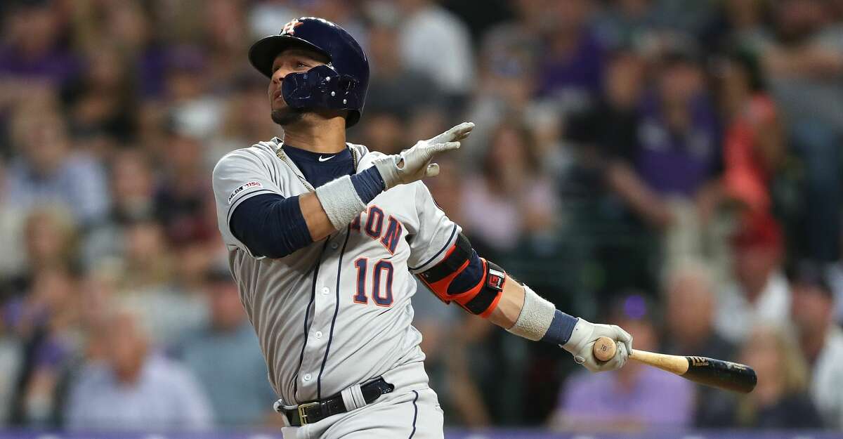 DENVER, COLORADO - JULY 02: Yuli Gurriel #10 of the Houston Astros hits a 2 RBI home run in the seventh inning against the Colorado Rockies at Coors Field on July 02, 2019 in Denver, Colorado. (Photo by Matthew Stockman/Getty Images)