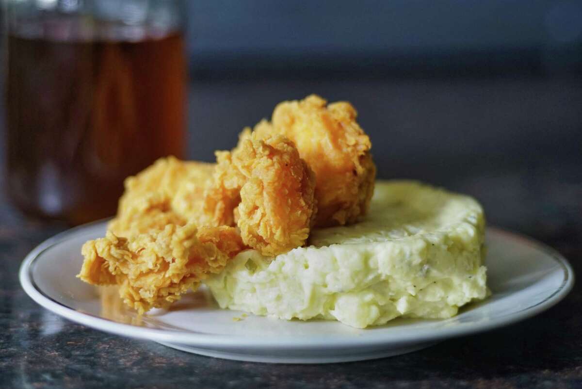 A view of fried shrimp and potato salad at Allie B's Cozy Kitchen on Tuesday, June 11, 2019, in Albany, N.Y. (Paul Buckowski/Times Union)