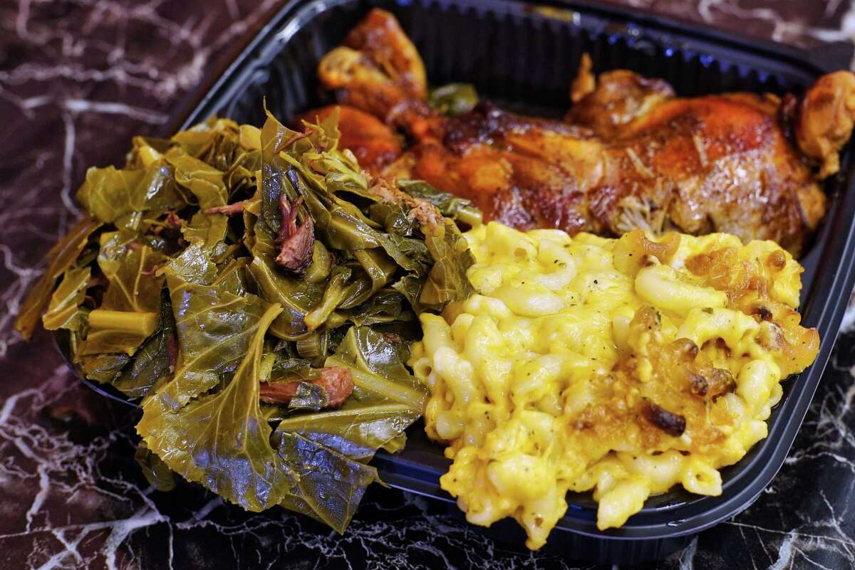 A view of cooked chicken, macaroni and cheese, and collard greens at Kitchen 216, on Tuesday, June 11, 2019, in Albany, N.Y. (Paul Buckowski/Times Union)