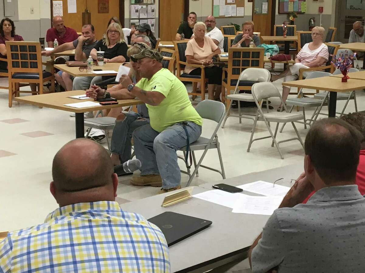 Tyler Street residents Frank and Tracey Ettore address the Town Council on Tuesday, July 2, 2019, about what they say is the rat problem in their neighborhood near the old East Haven High School.