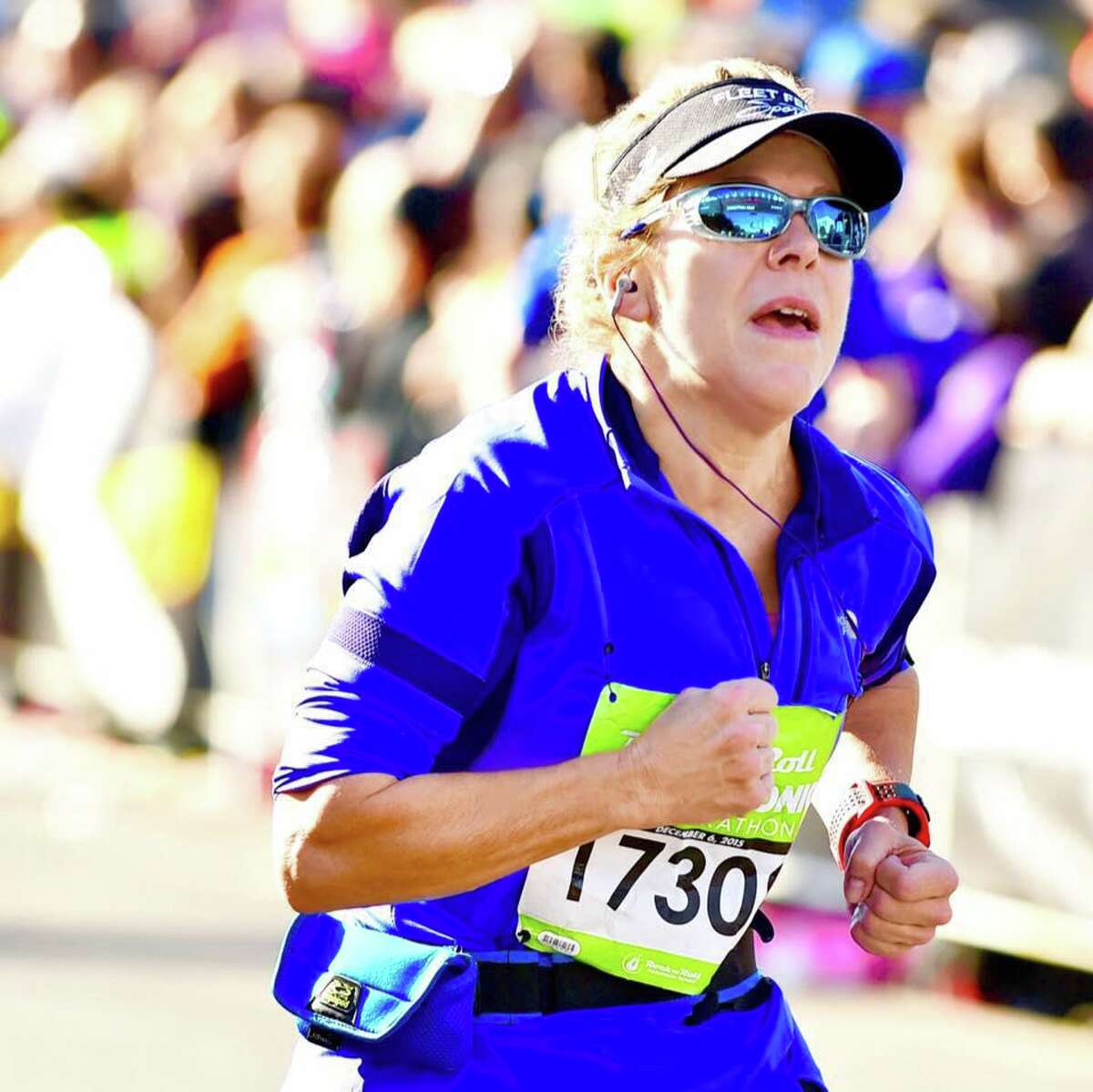 Tina Louise Booth Smith running in the 2015 Rock 'n' Roll San Antonio Half Marathon.