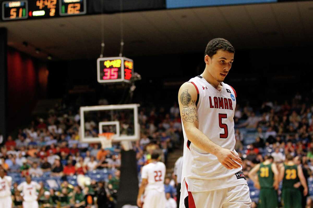 DAYTON, OH - MARCH 14: Mike James #5 of the Lamar Cardinals walks towards the bench in the second half after he fouled out against the Vermont Catamounts in the first round of the 2011 NCAA men's basketball tournament at UD Arena on March 14, 2012 in Dayton, Ohio. (Photo by Gregory Shamus/Getty Images)