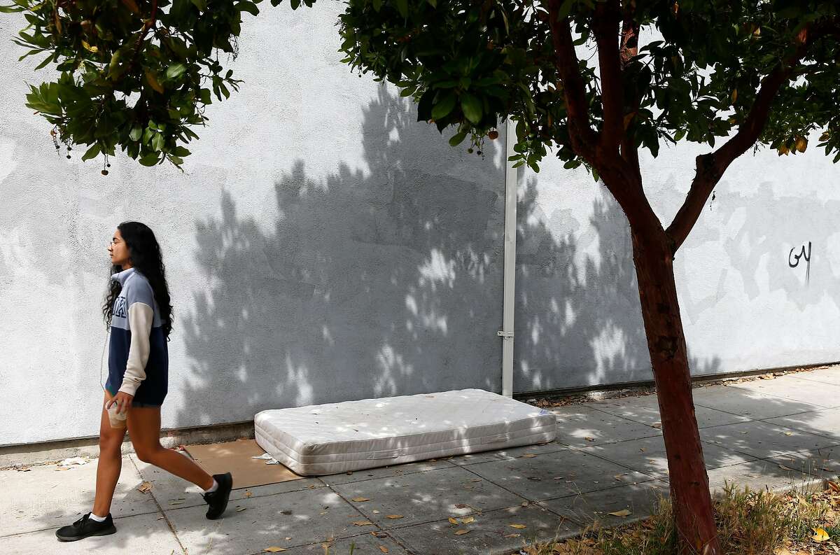 Mattresses and other debris are abandoned on Ellsworth Street after Cal students have moved out of apartments for the summer break in Berkeley, Calif. on Thursday, June 27, 2019. Phil Bokovoy is among a group of residents who have filed lawsuits against UC Berkeley over the negative impact that the rising student enrollment has had on the surrounding neighborhoods.