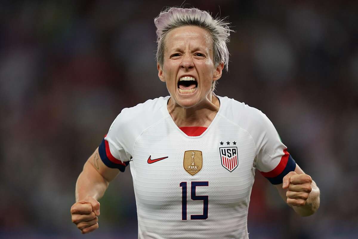 TOPSHOT - United States' forward Megan Rapinoe celebrates after scoring a goal during the France 2019 Women's World Cup quarter-final football match between France and USA, on June 28, 2019, at the Parc des Princes stadium in Paris. (Photo by Lionel BONAVENTURE / AFP)LIONEL BONAVENTURE/AFP/Getty Images