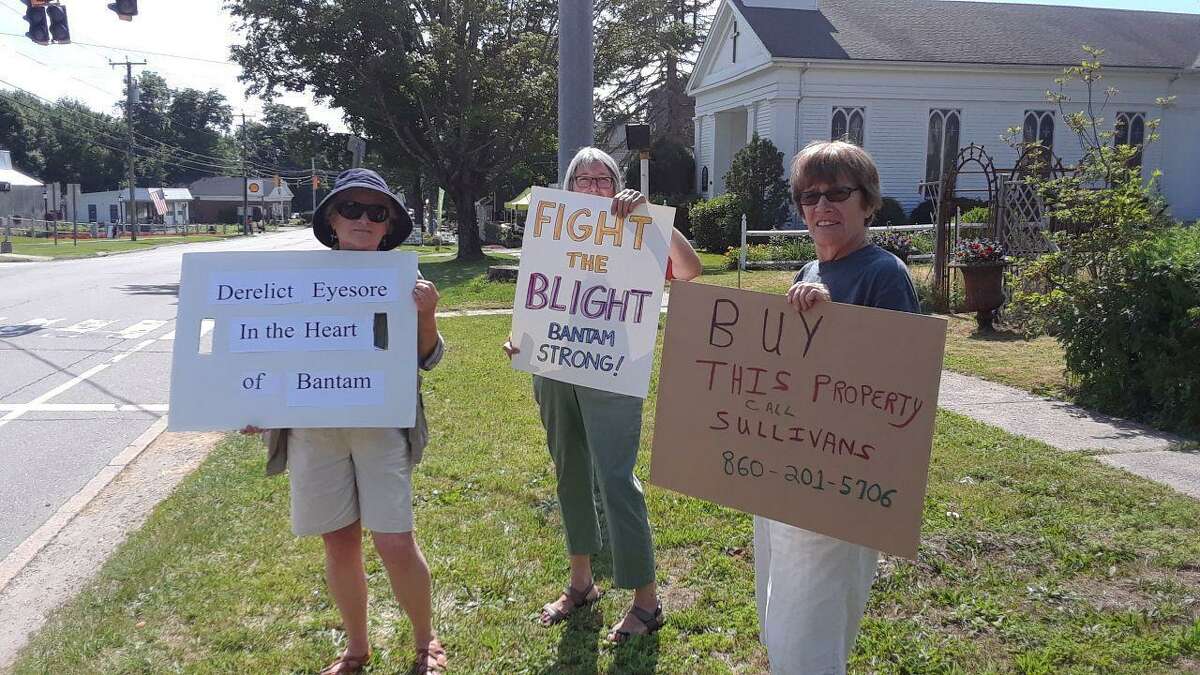 From left, Carol Powers, Anne Haas and Lauren Sage protest blight in the Bantam Borough.
