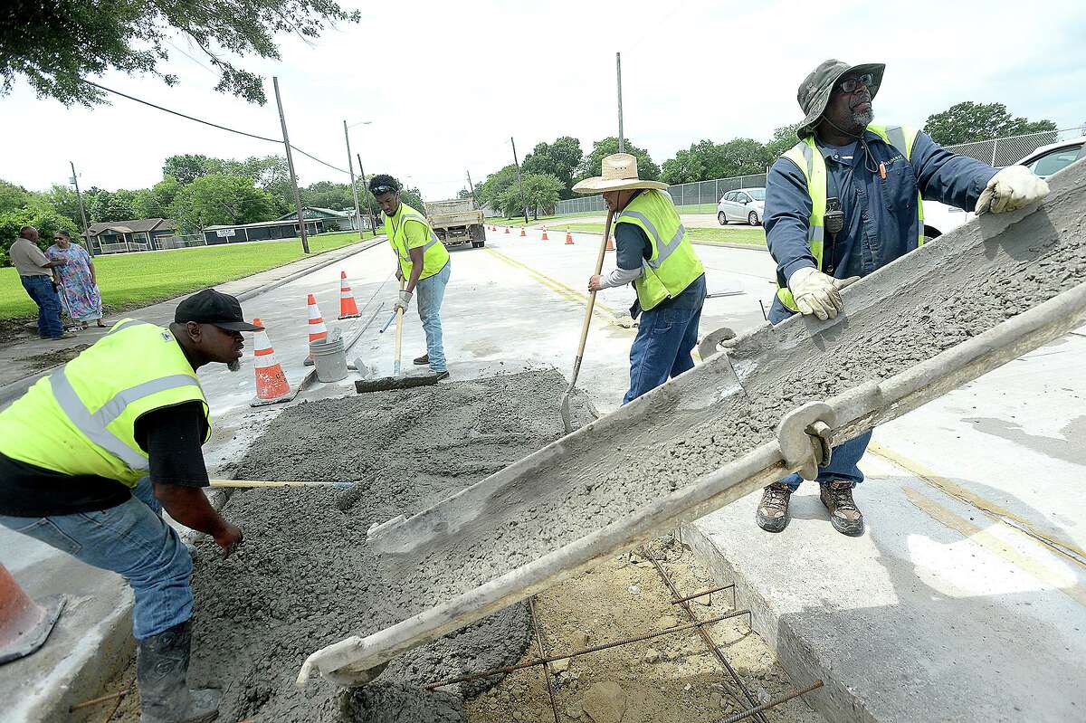City of Beaumont workers brave the elements as they lay fresh concrete on a stretch of S. Fourth Street Thursday. A heat advisory was issued for Southeast Texas Thursday, with "feel like" temperatures over 100 degrees. The high heat is expected to continue through Friday. People are advised to stay hydrated, wear protective head covering and avoid strenuous activity for prolonged periods of time. Photo taken Thursday, June 20, 2019 Kim Brent/The Enterprise