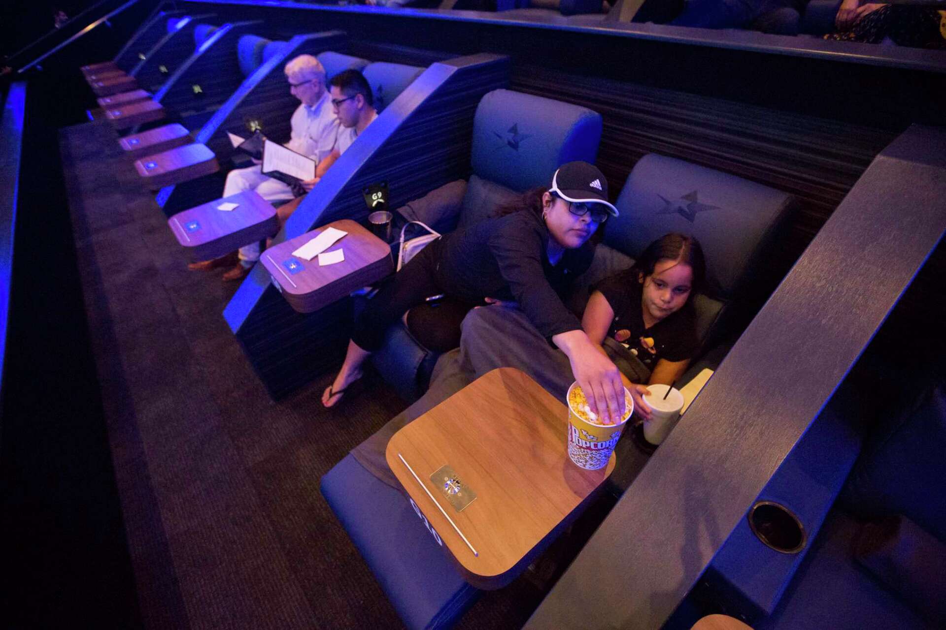 Movie theaters up the ante on amenities