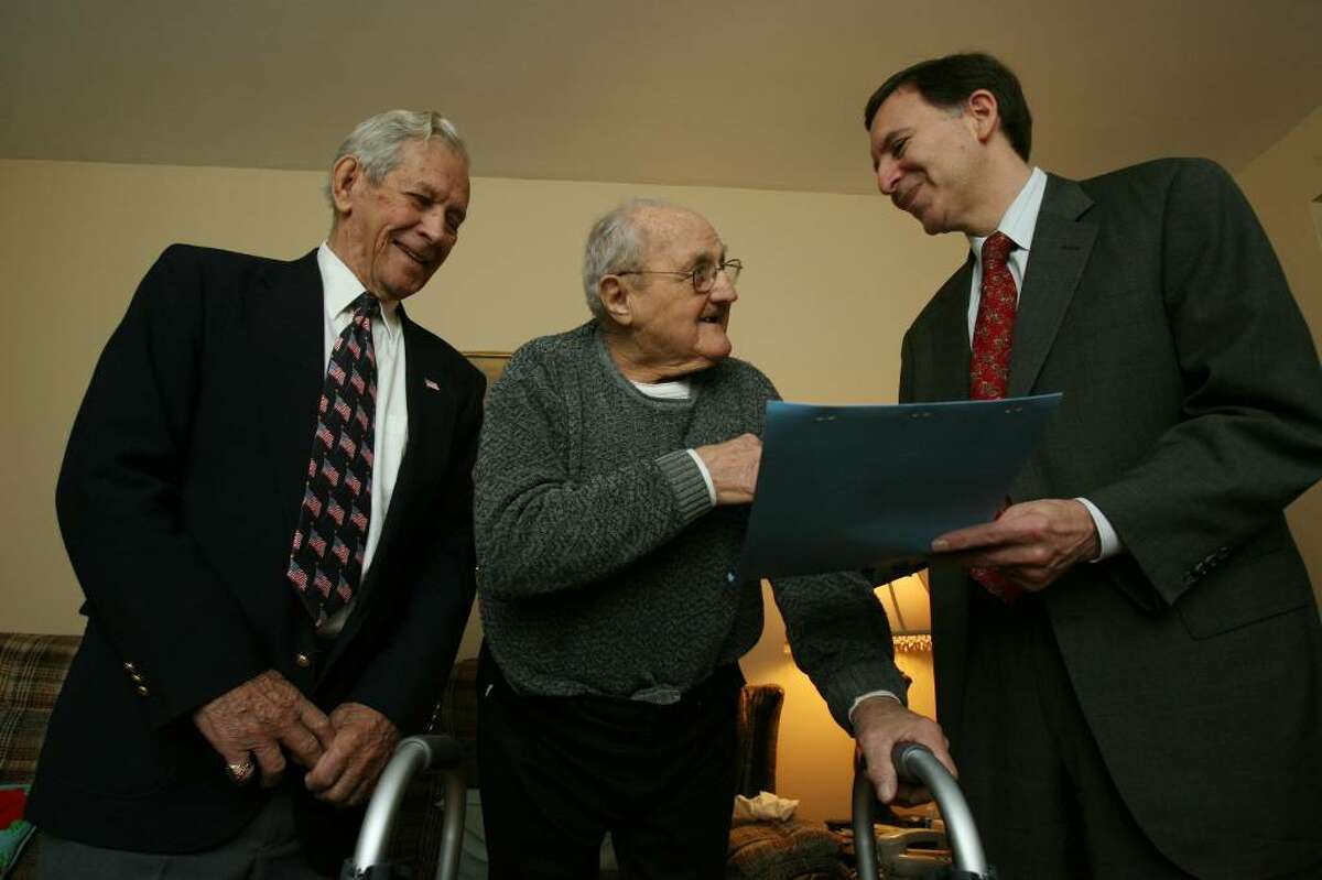 Nello Ceccarelli died at the age of 94 on Thursday July 29, 2010. Ceccarelli served on the fairiled RTM for 55 years and in 2007 he was given a proclamation by Fairfield First Selectman Ken Flatto, right. Joe Gall, left, also gave Ceccarelli a medal an honorary membership in the American Legion. Flatto declared Dec. 7 to be Nello Ceccarelli day in Fairfield.