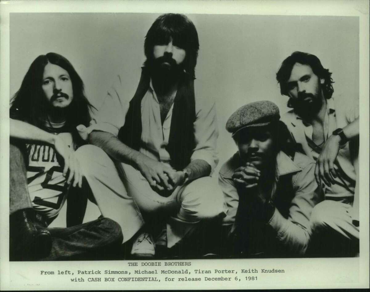 The Doobie Brothers - from left, Patrick Simmons, Michael McDonald, Tiran Porter, Keith Knudsen, with "Cash Box Confidential", for release December 6, 1981.