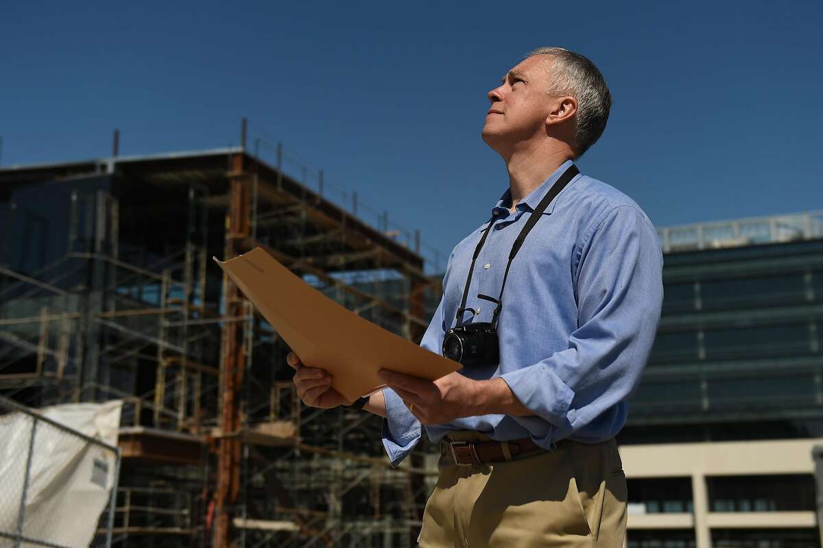 Appraiser Matthew D. Boxberger of Santa Clara County visits a construction site in San Jose.