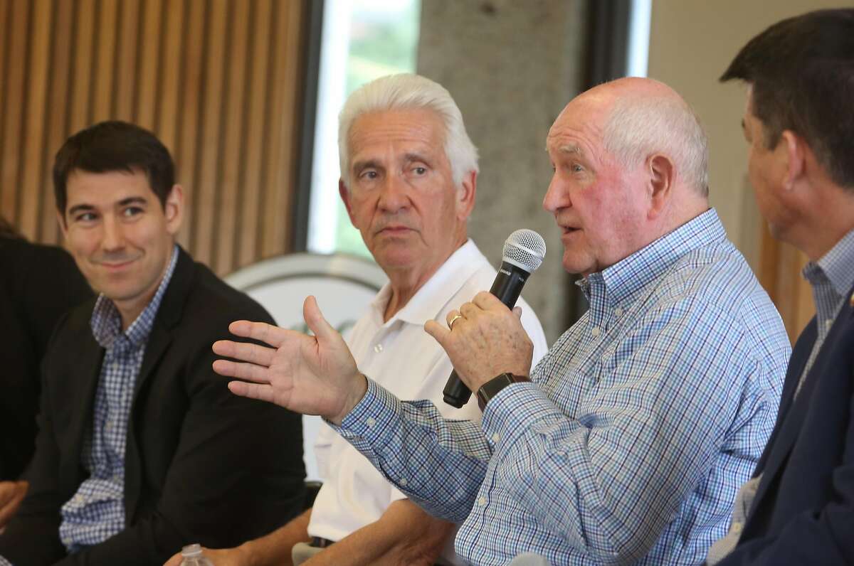 Agriculture Secretary Sonny Perdue makes a point as, from left, Reps Josh Harder, Jim Costa and TJ Cox look on during a town hall meeting on agriculture in the Central Valley on Friday, 6/28, 2019 at Los Banos Fairgrounds Park in Los Banos, California.
