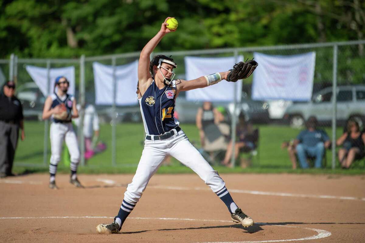 Milford’s Maddy bull delivers a pitch during the District IV championship game, Friday, July 5, 2019, at Foote Field in Milford, CT