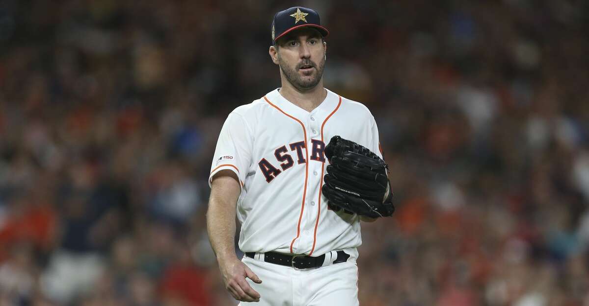 Houston Astros starting pitcher Justin Verlander (35) heads to the dugout after finishing the seventh inning of the MLB game against the Los Angeles Angels at Minute Maid Park on Friday, July 5, 2019, in Houston. Verlander allowed four runs, including three home runs in seven innings.