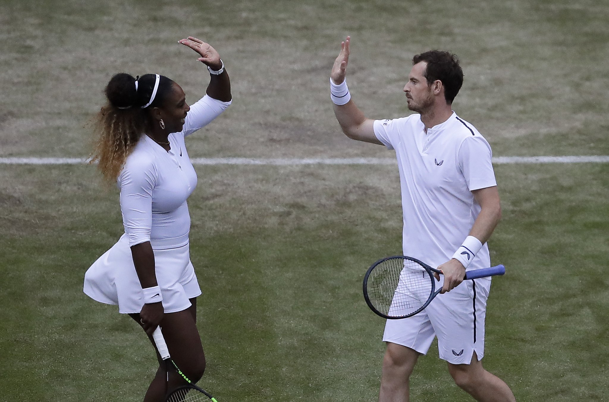 Serena Williams wins in singles, mixed doubles at Wimbledon